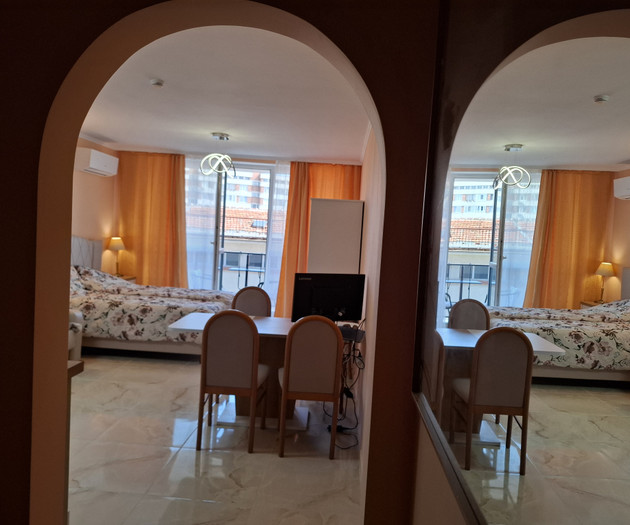 Light studio with balcony close to sea and center