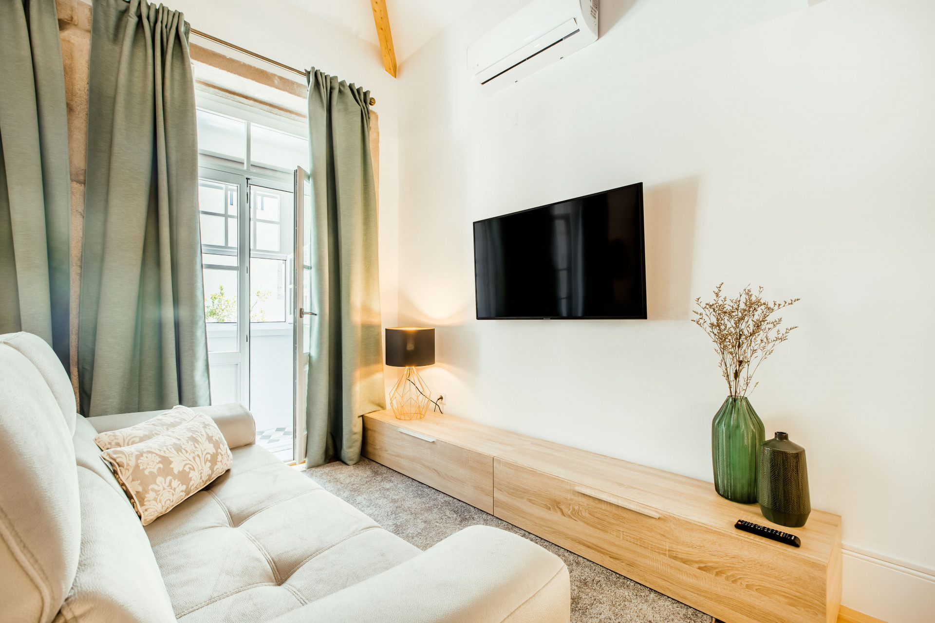 Studio with Sofa, Dining Table and TV