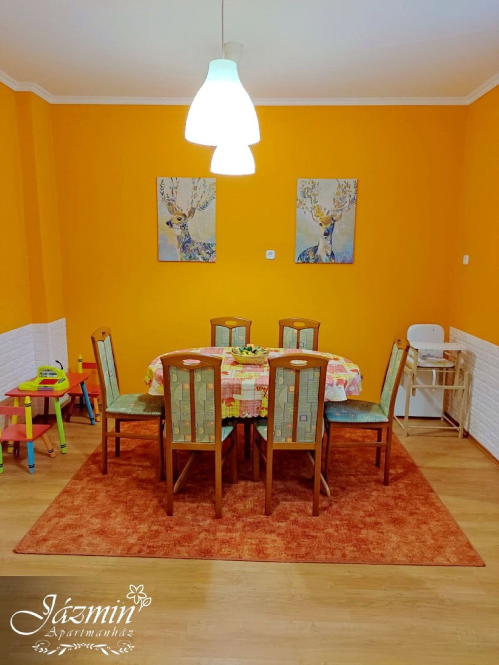 Dining area with deer artwork