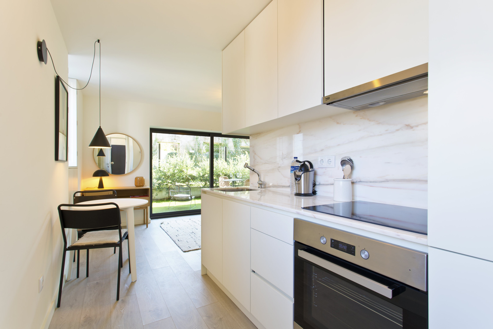 Open kitchen dining area garden view