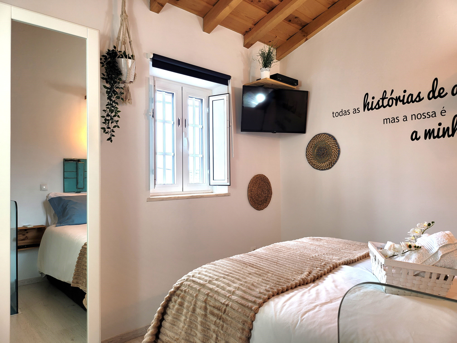 Bedroom with wooden beamed ceiling