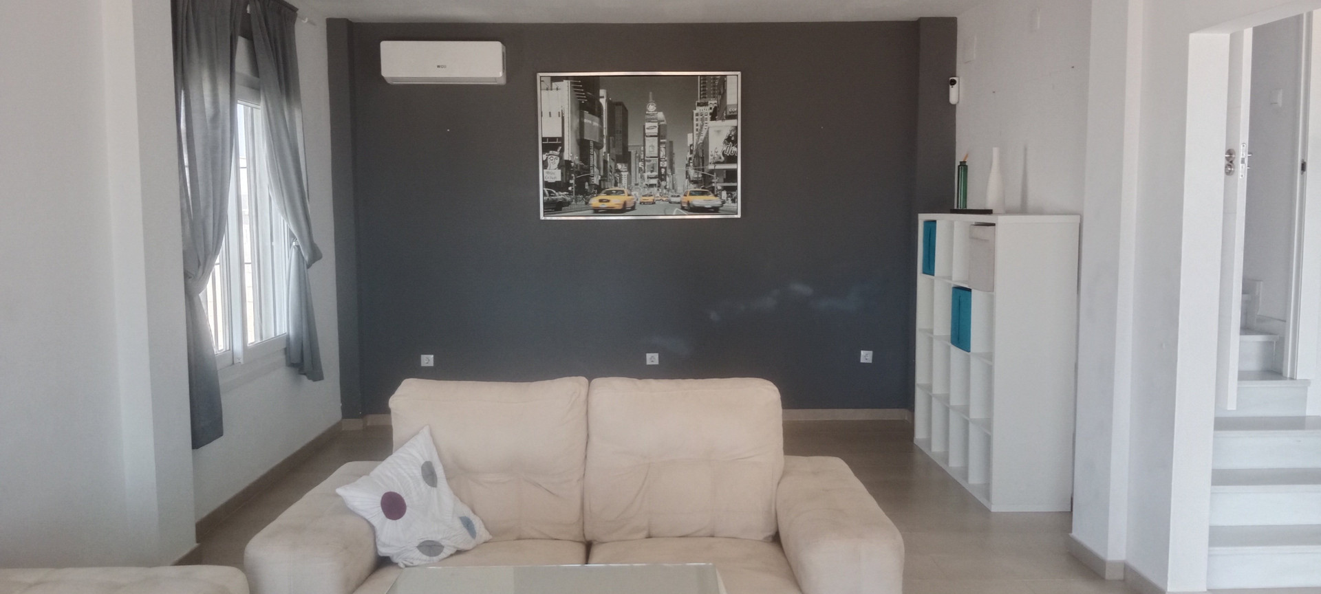 Living room with sofa and art