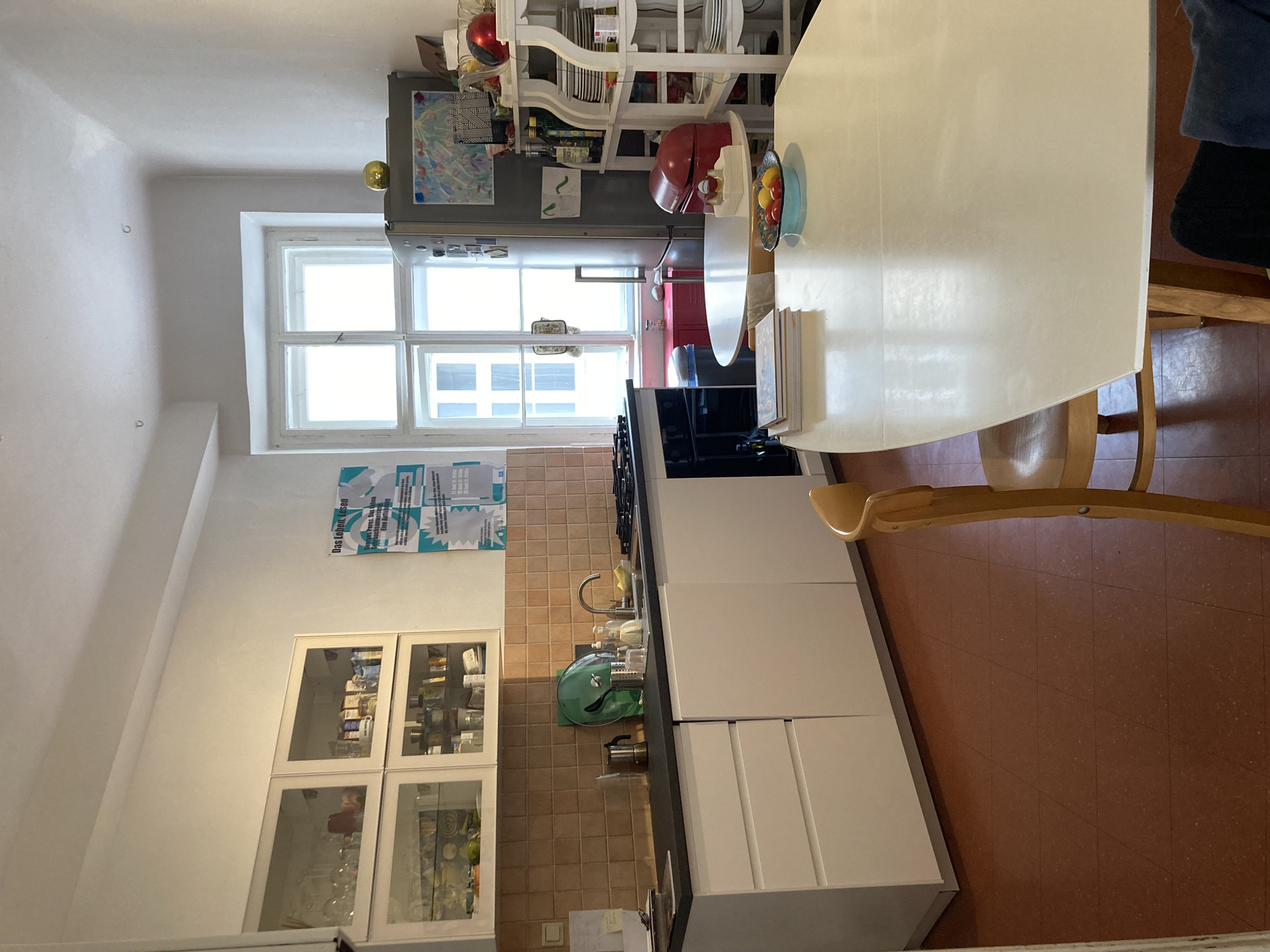Kitchen with cabinets and window