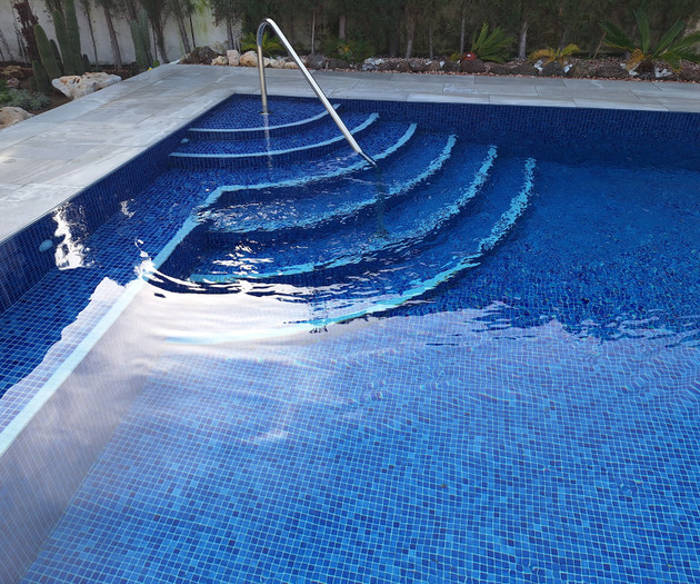 Pool steps with blue tiles