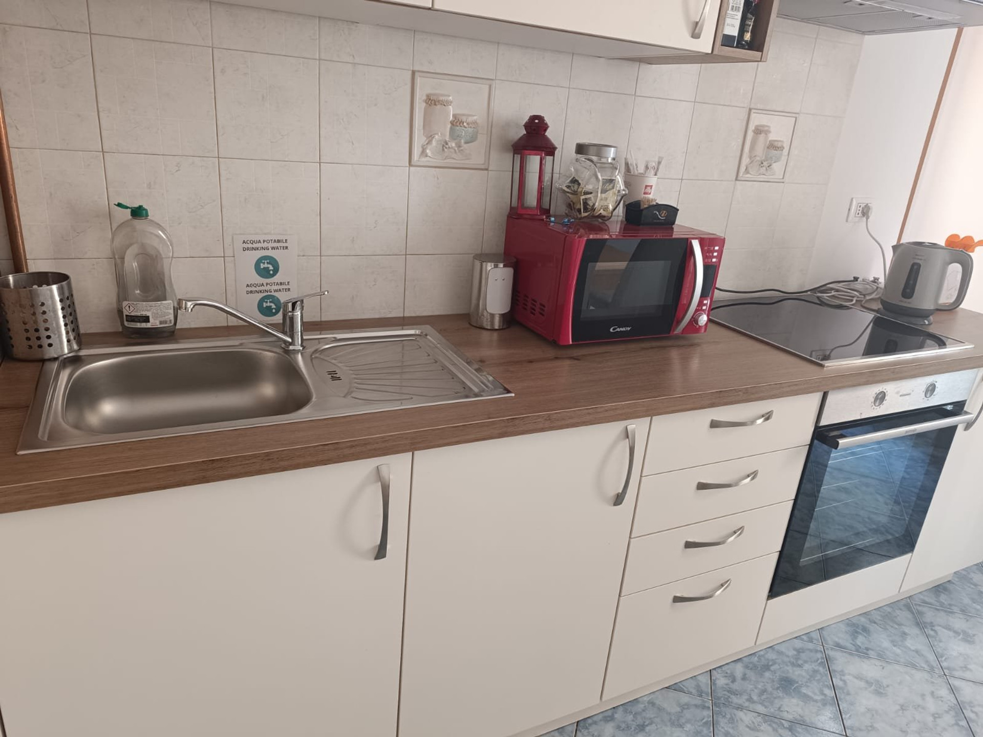 Kitchen counter with sink and appliances