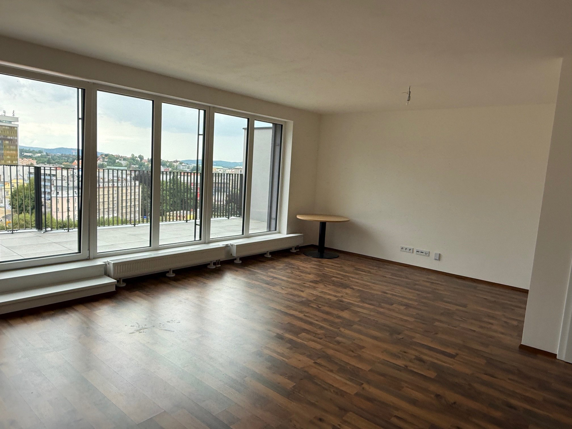 Living room with balcony views