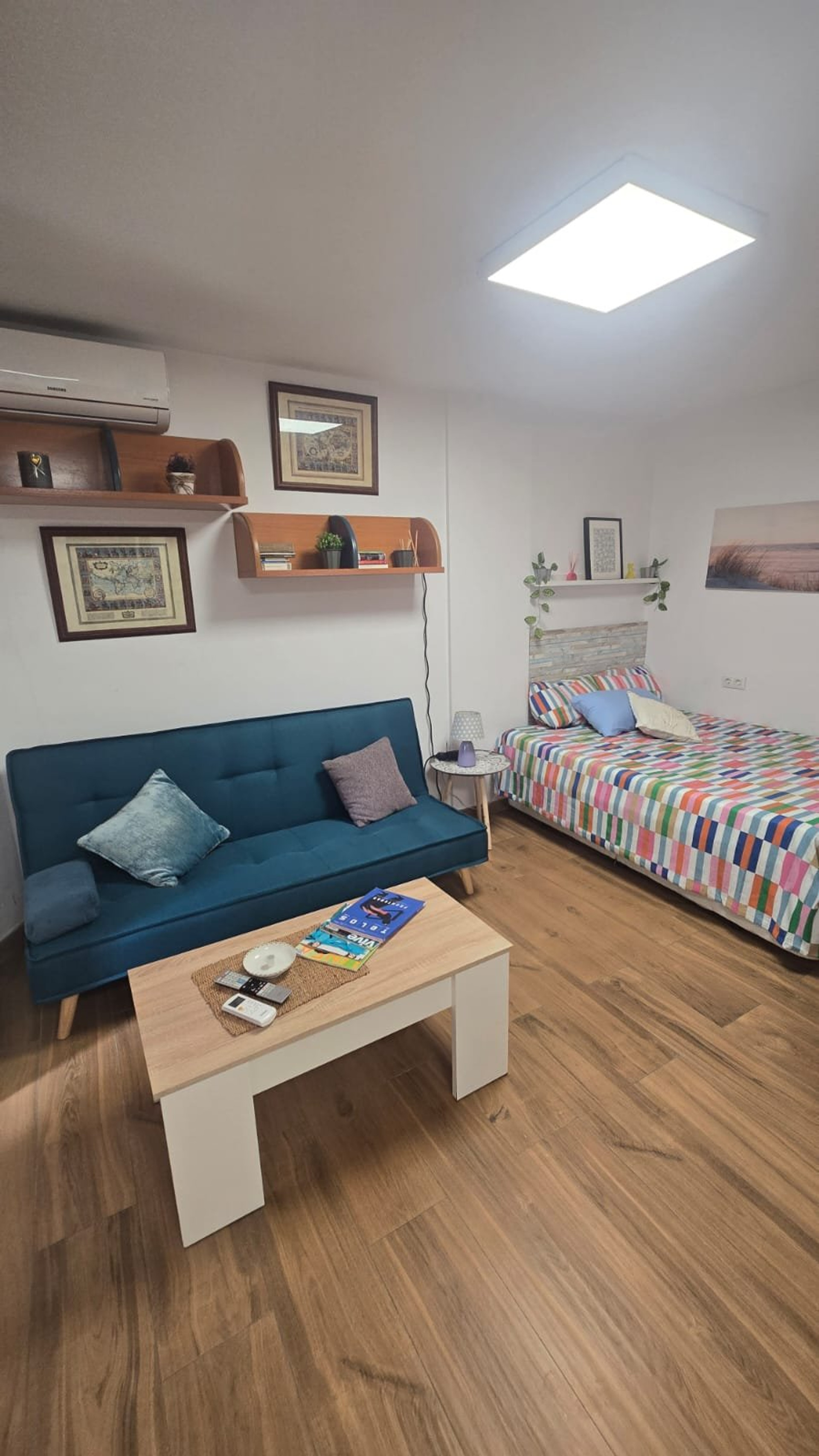Living room with sofa and bed