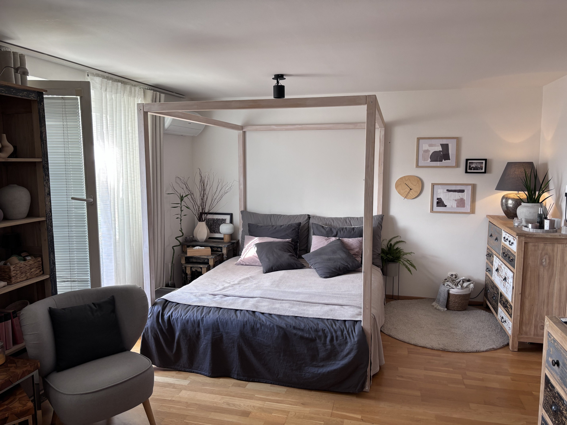 Spacious bedroom with canopy bed