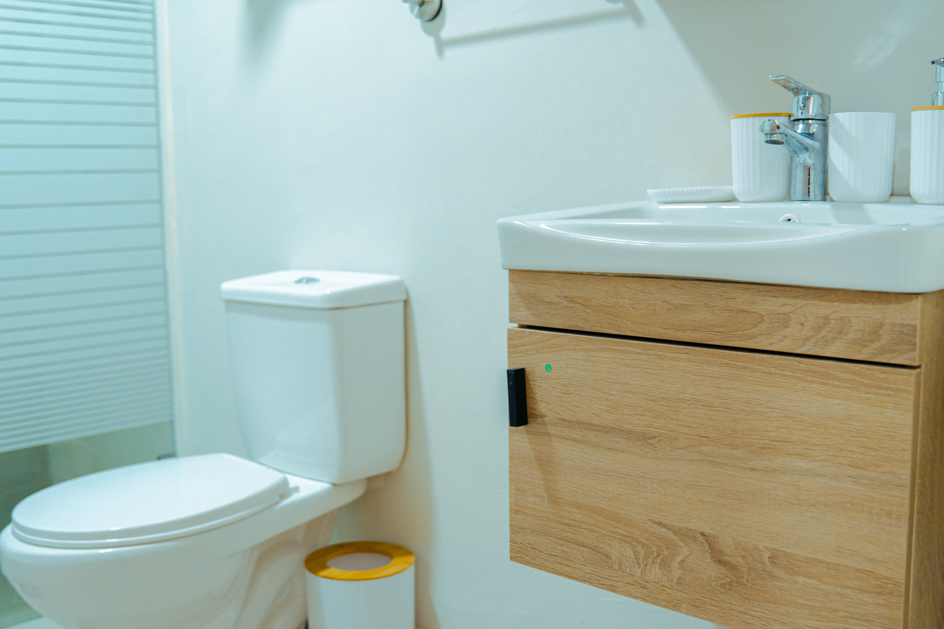 Bathroom with sink and toilet