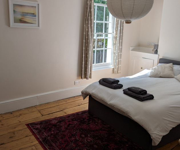 Bedroom with garden view window