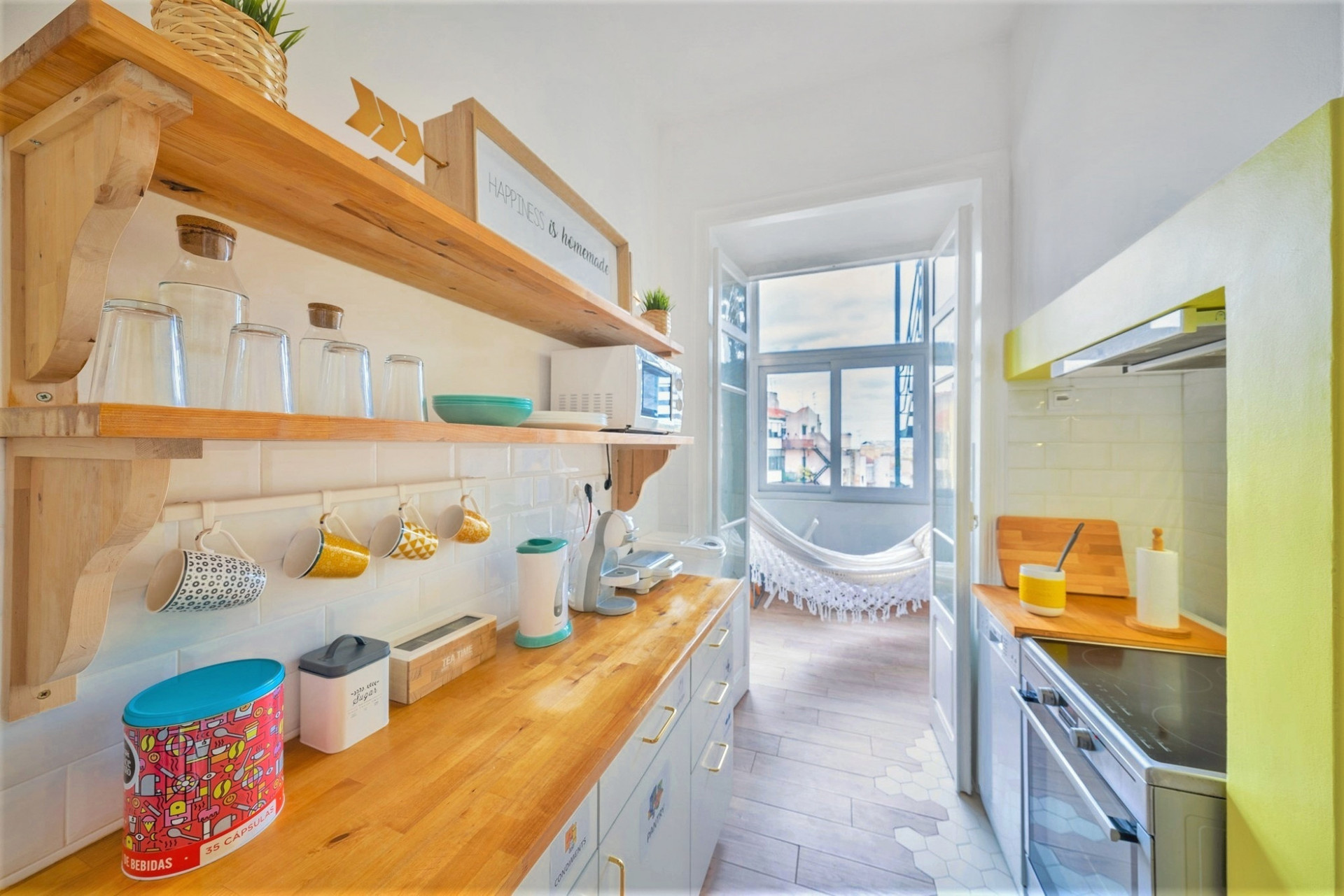 The Kitchen: Fully stocked, with dishwasher machine and electric oven.