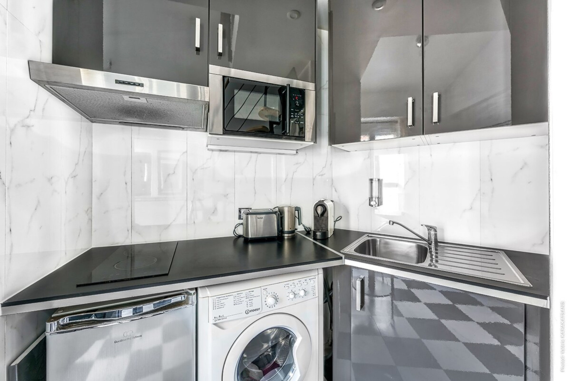 fully equipped kitchen: washing machine and dryer, refrigerator, coffee...