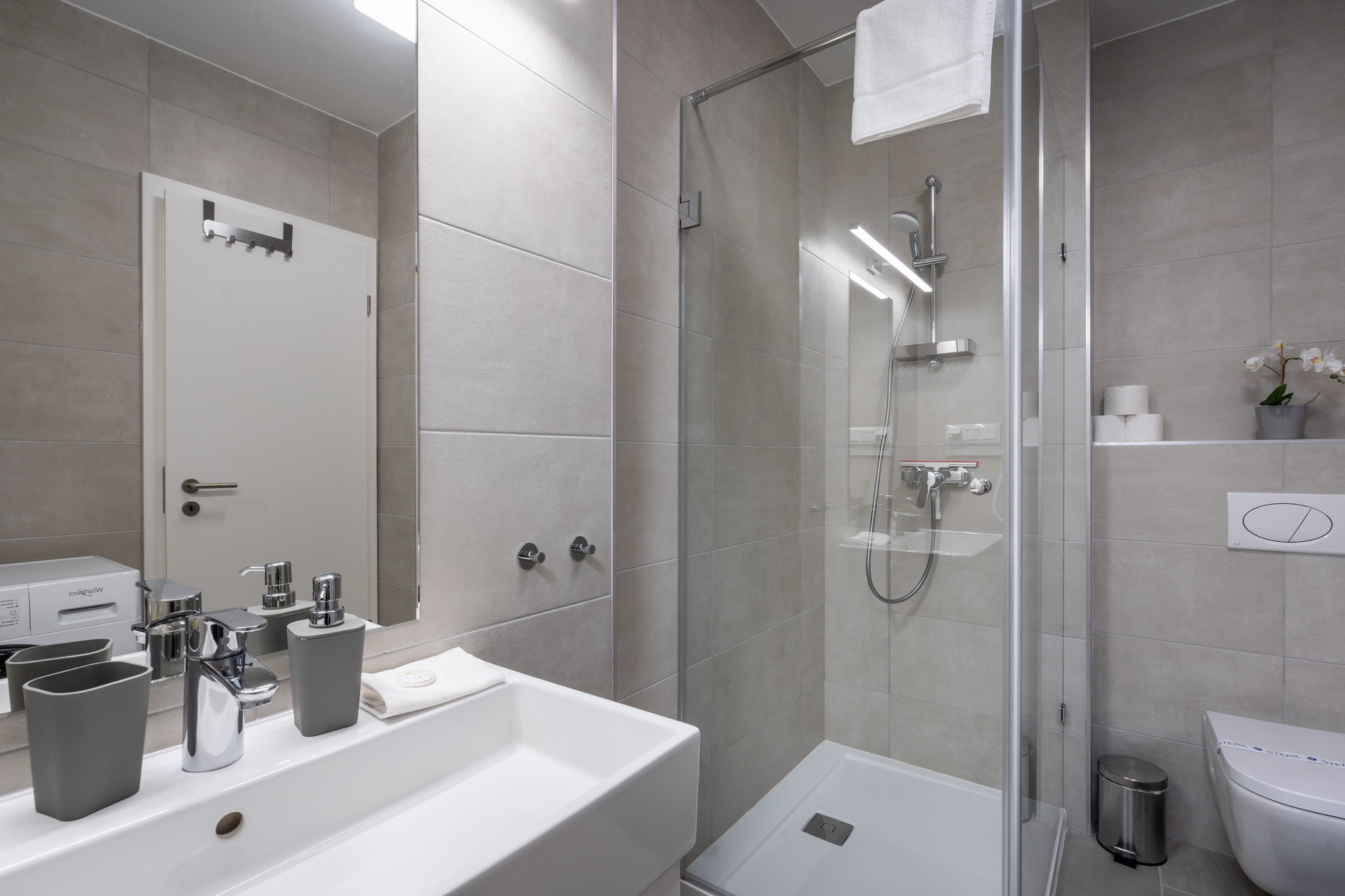Bathroom with shower and sink