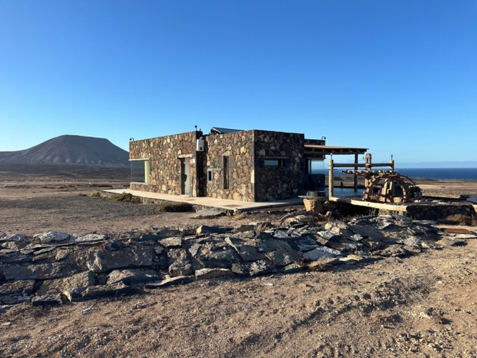 Stone house exterior volcanic landscape