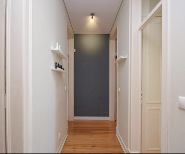 Hallway with wooden floors