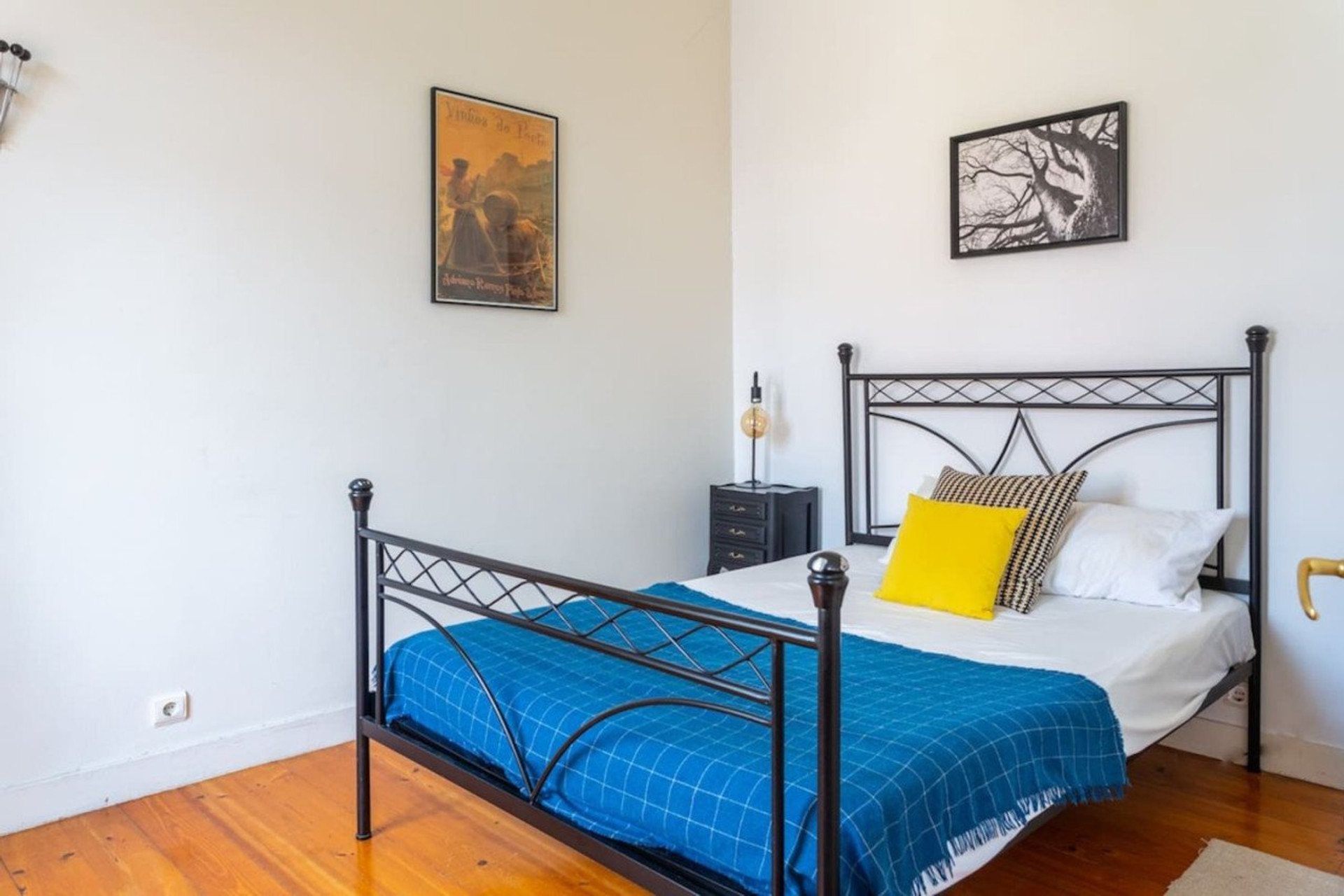 Bedroom with blue bedspread