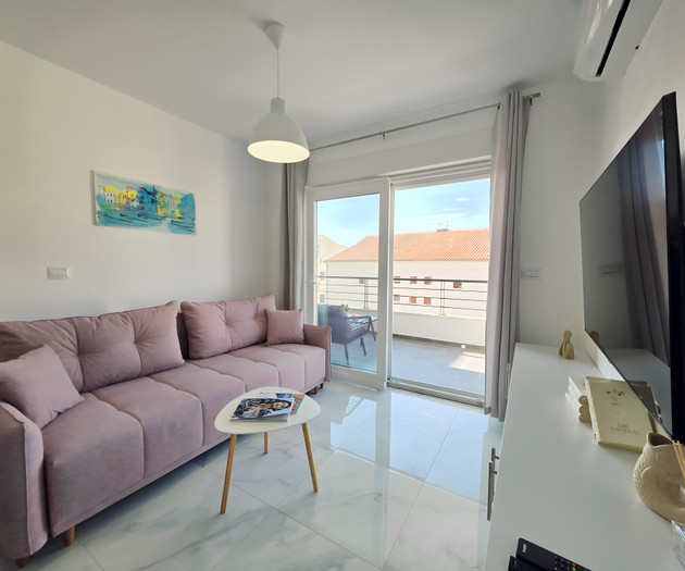 Living room with balcony access