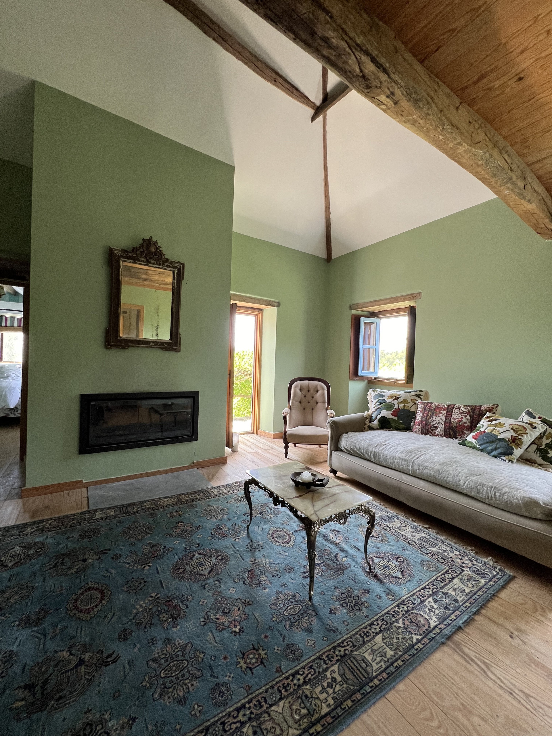 Living room with blue rug