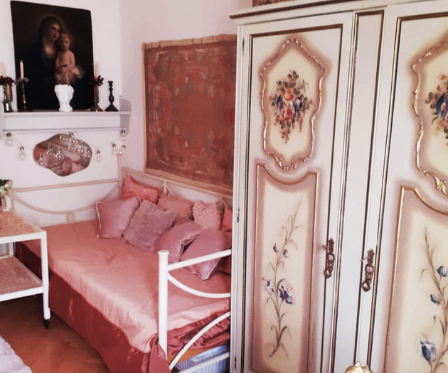 Bedroom with ornate wardrobe