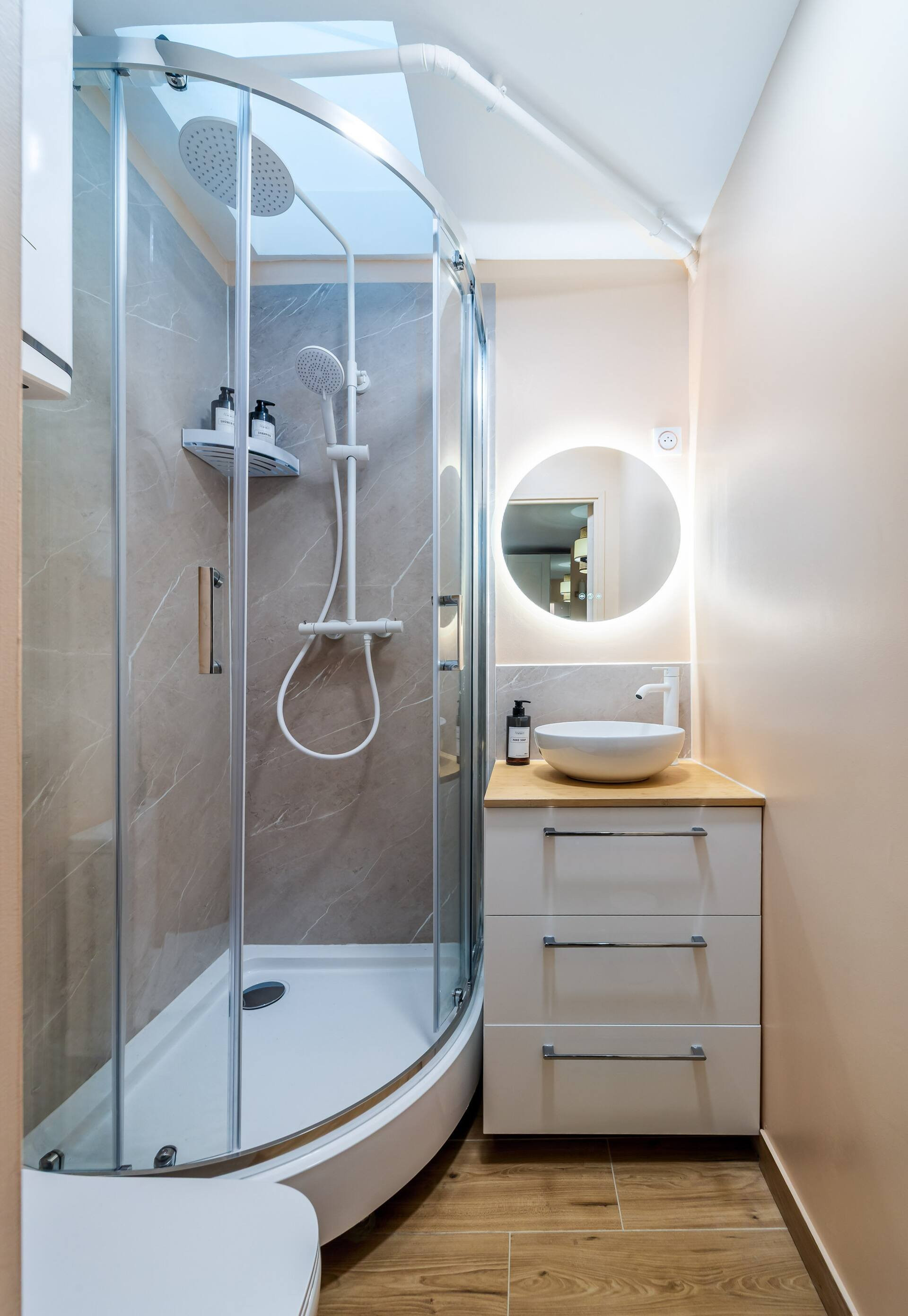 Bathroom with shower and sink