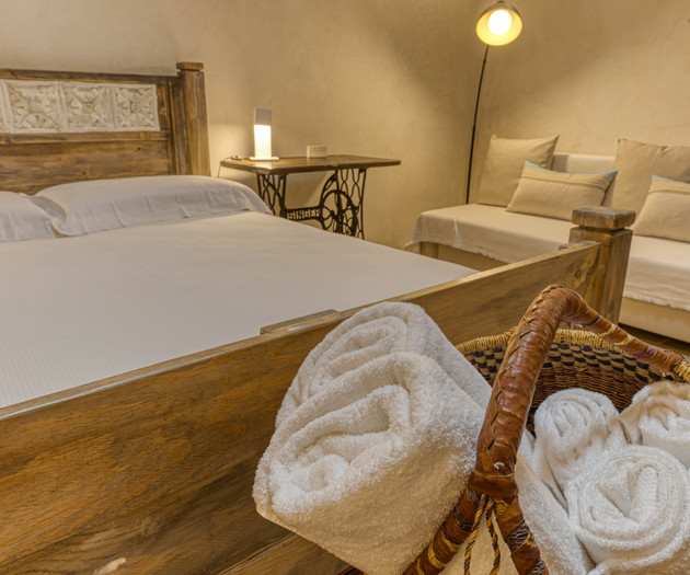 Bed with towel basket