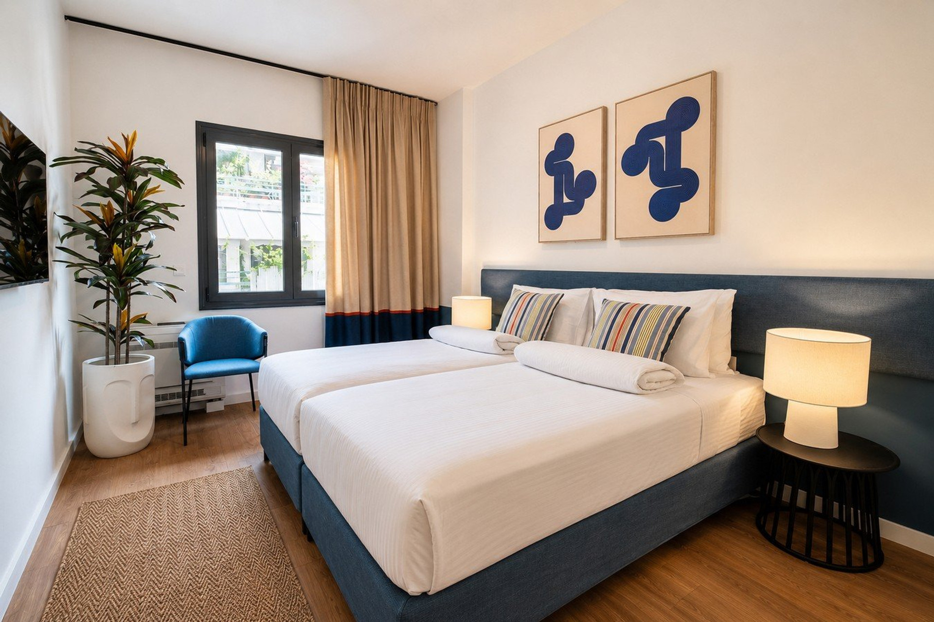 Twin bedroom with blue accents