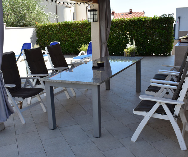 Patio seating near pool