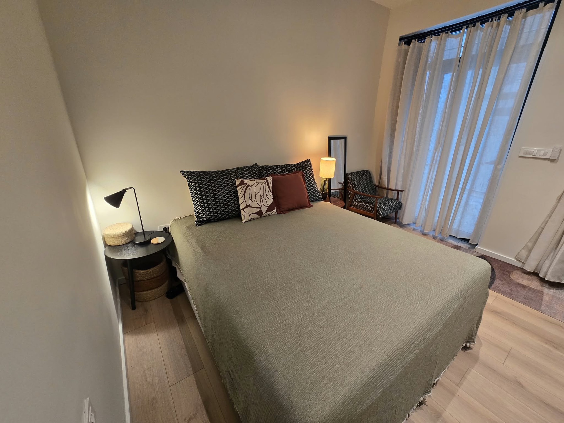 Cozy bedroom with large bed