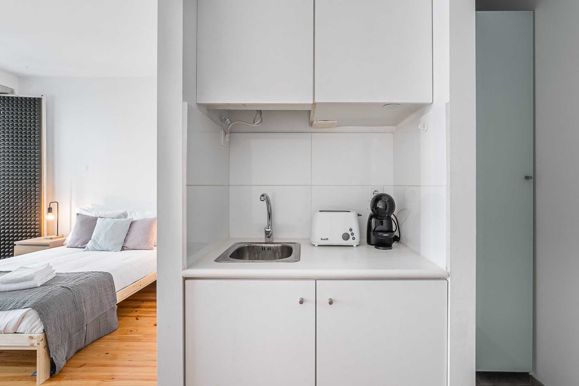 Kitchenette with sink and coffee maker