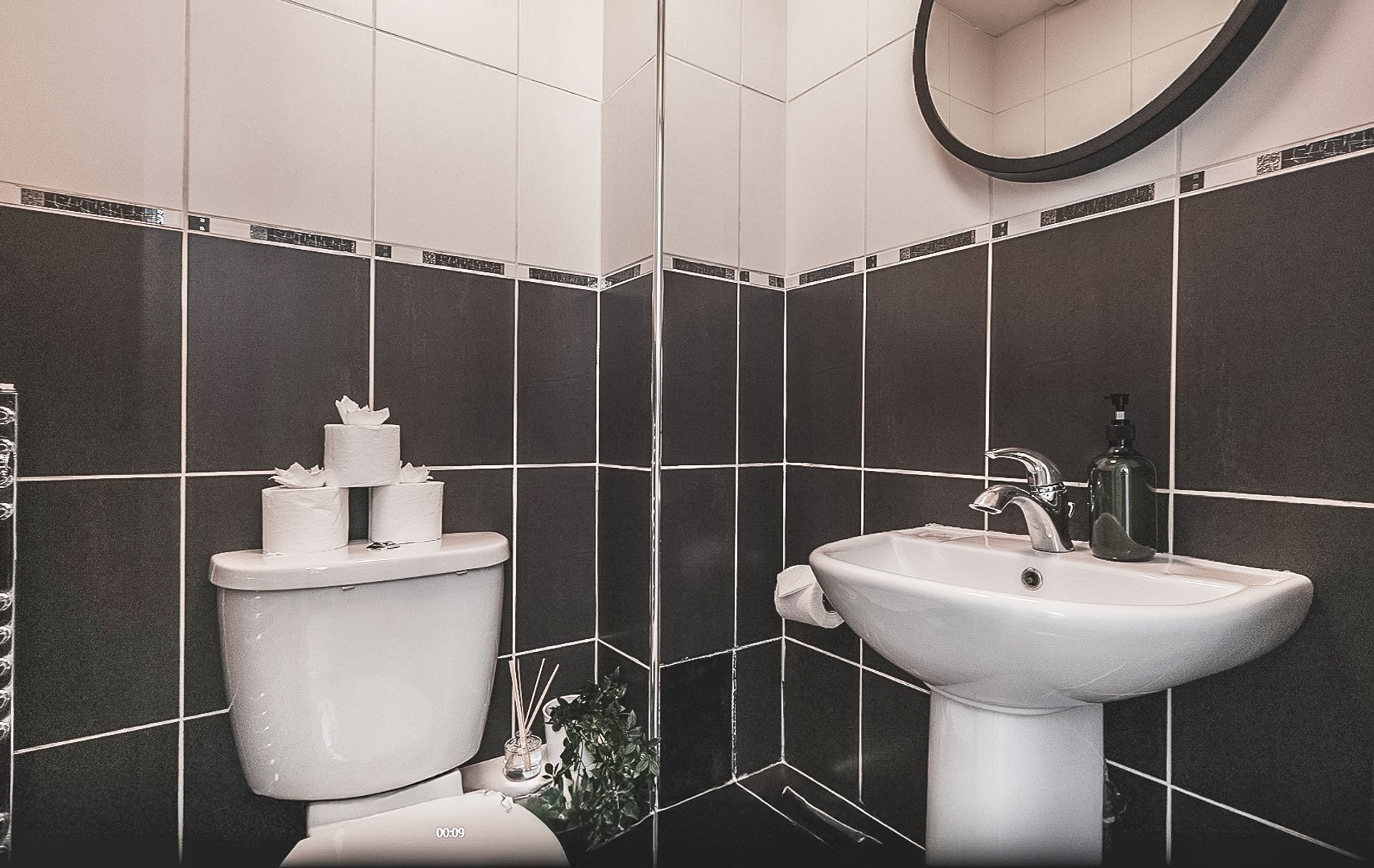 Compact bathroom with sink toilet