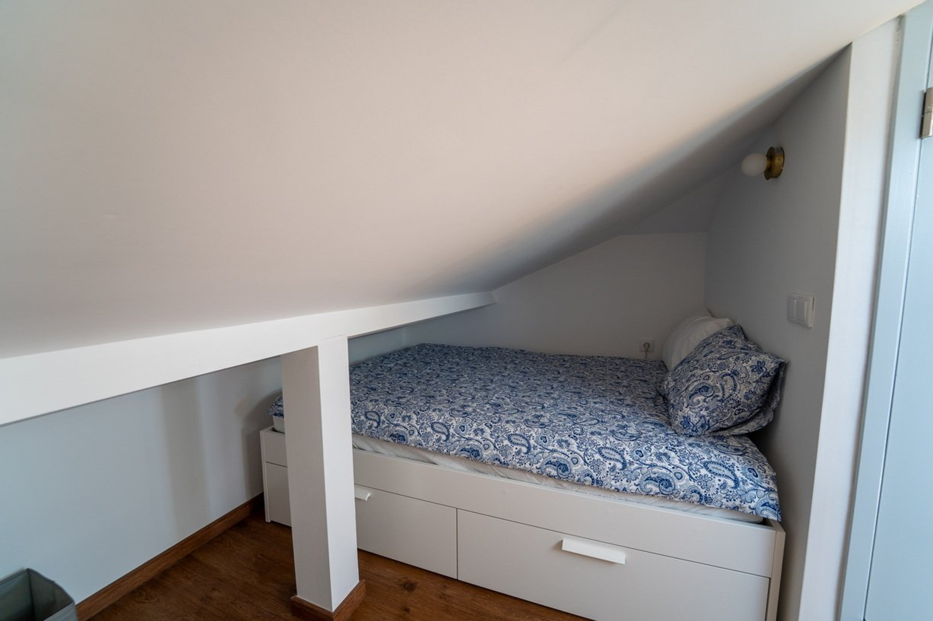 Cozy attic bed nook