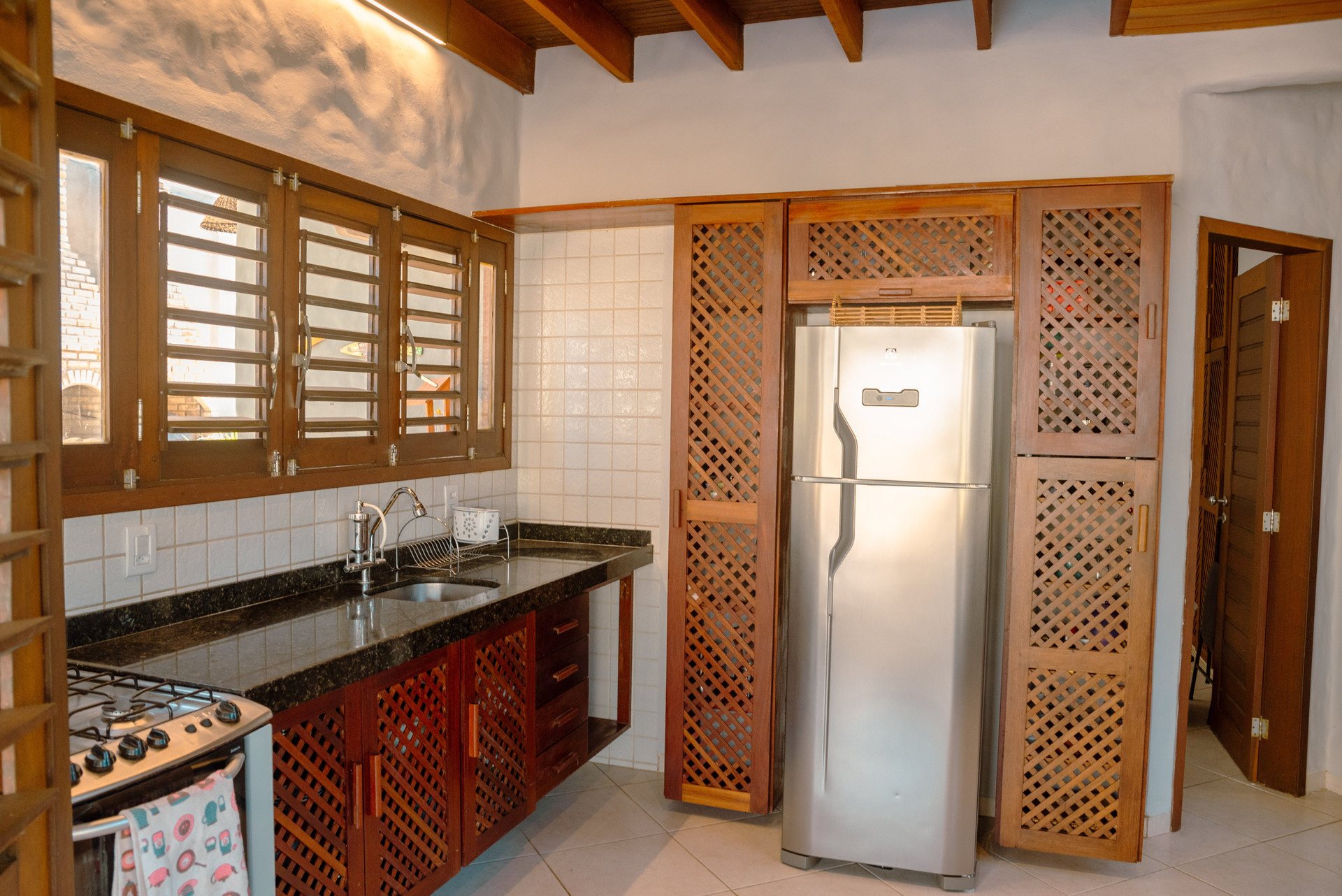 Kitchen with fridge and stove