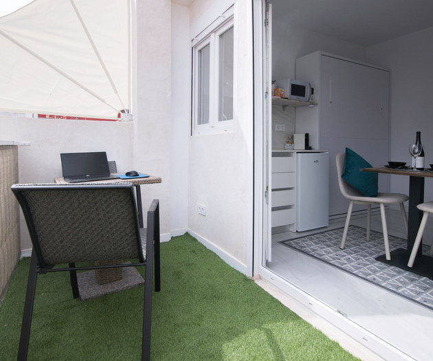 SleekLofts Affordable Tiny Studio with Balcony