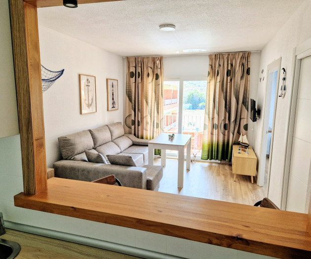 Open living room view from kitchen