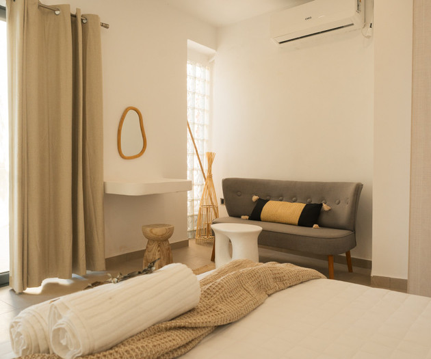 Bedroom seating corner and balcony door