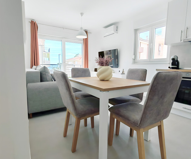 Dining table with sea view balcony