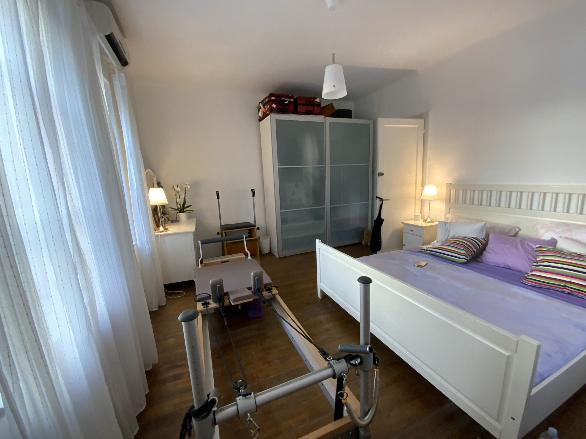 Bedroom with wardrobe and bed