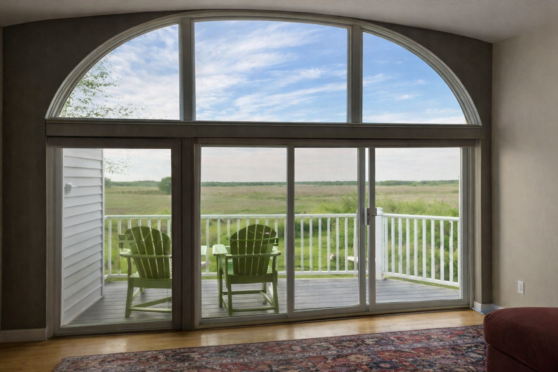 Living room arched window marsh view