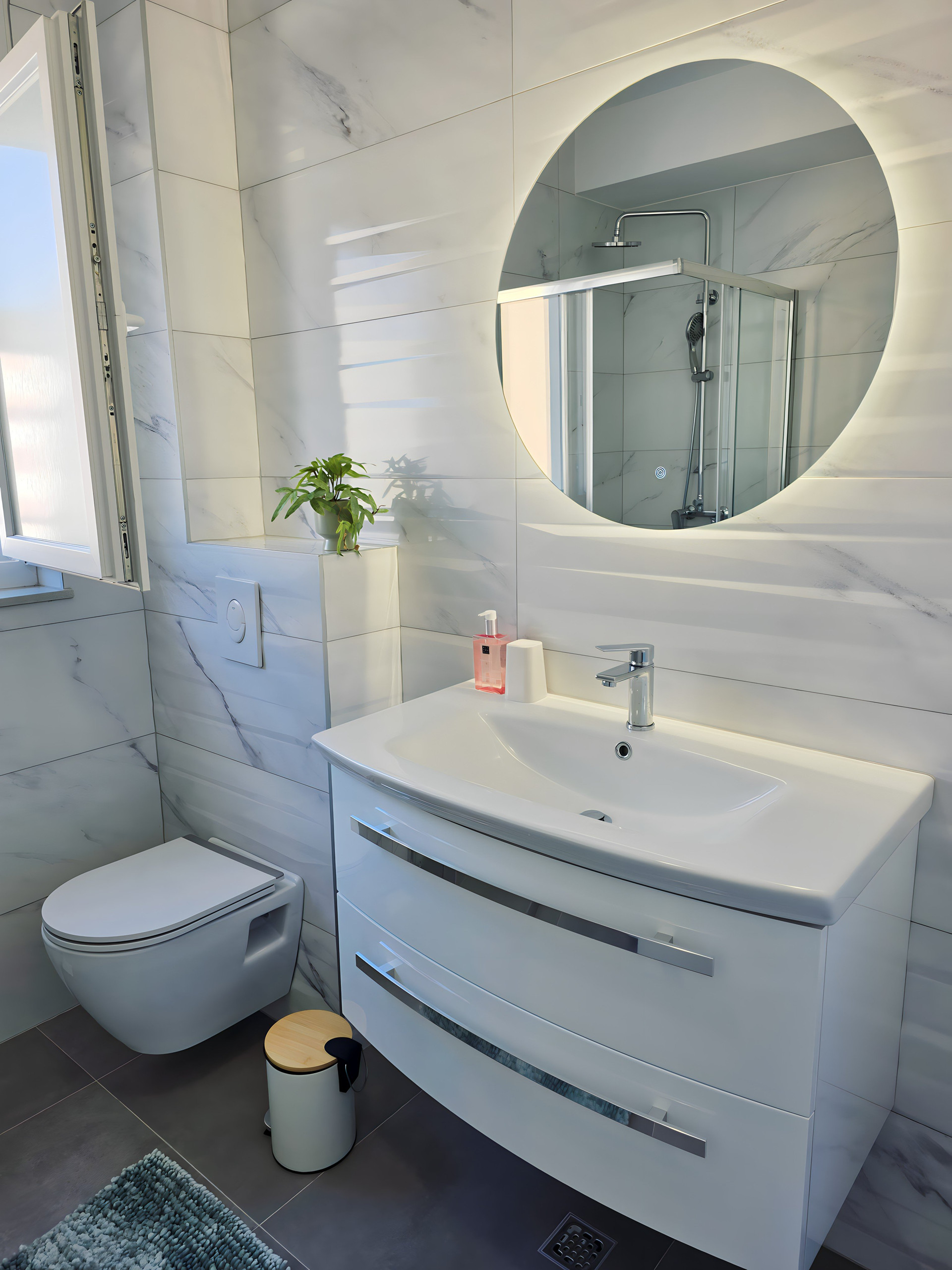 Bathroom sink with round mirror