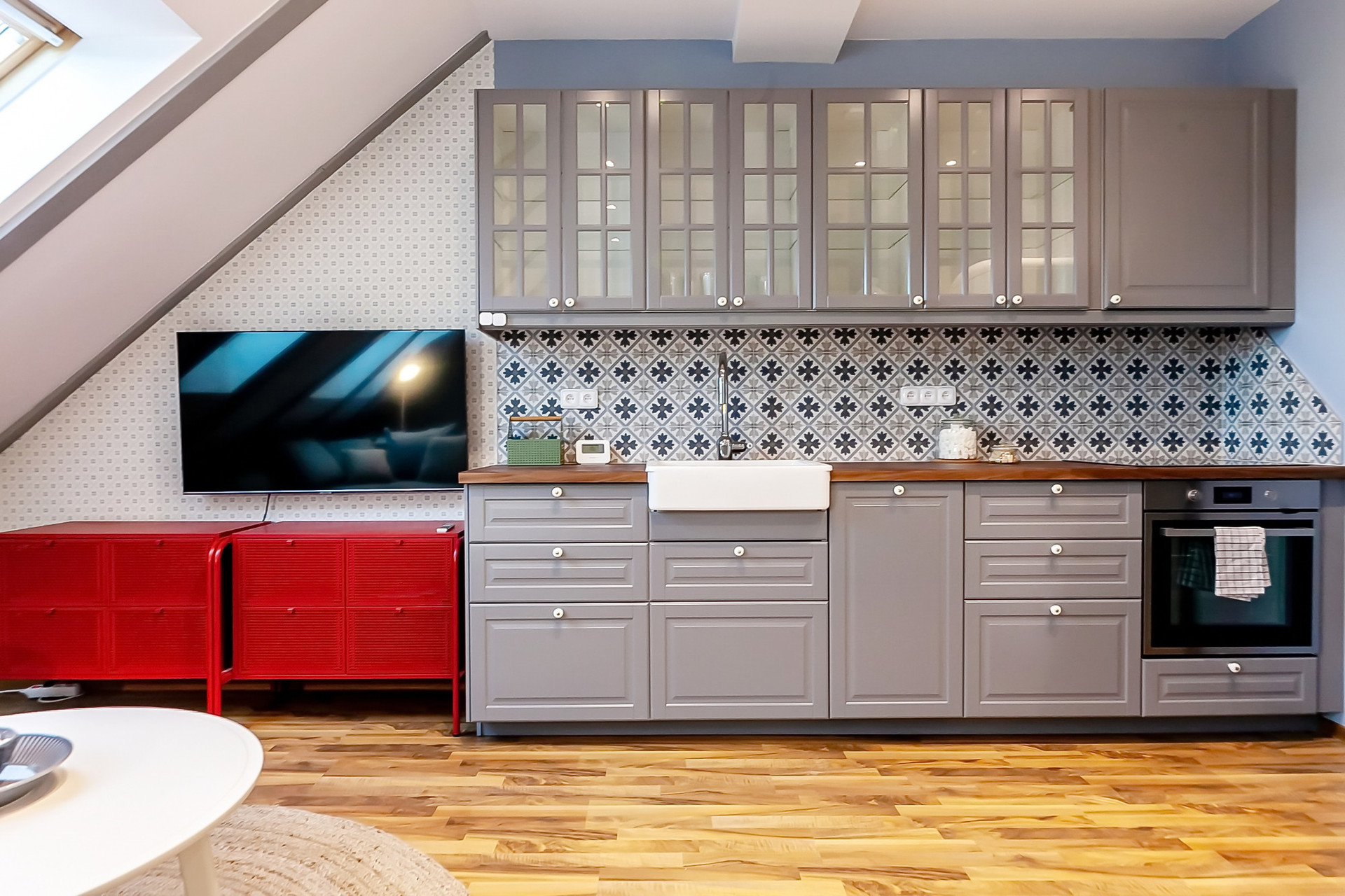 Gray kitchen with patterned tile backsplash
