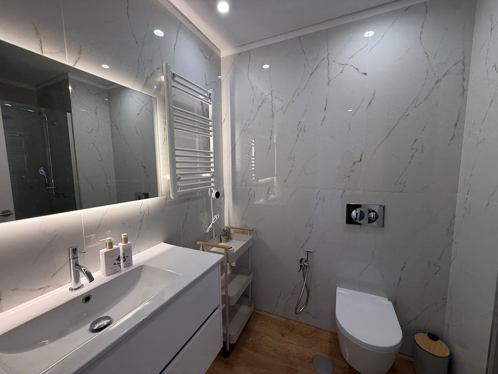 Full bathroom with sink and toilet