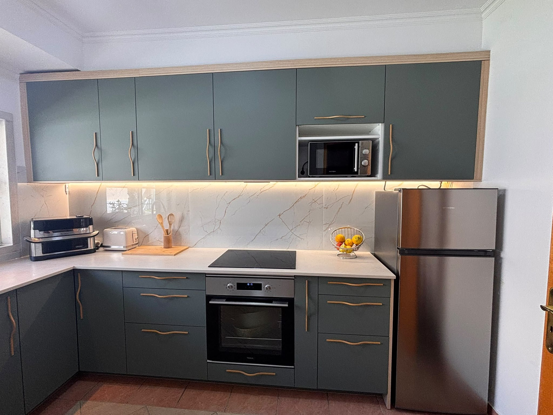 Modern kitchen with stainless appliances