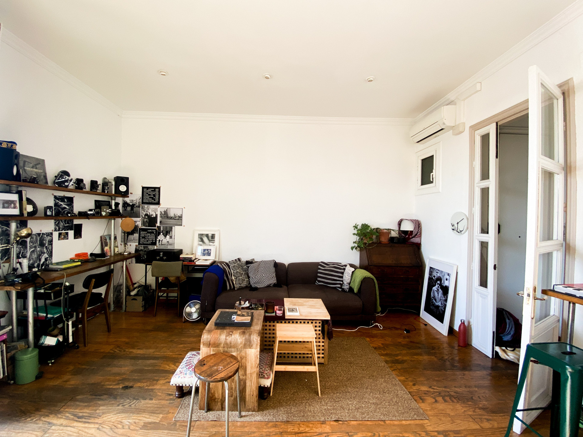 Living room with shelving and sofa