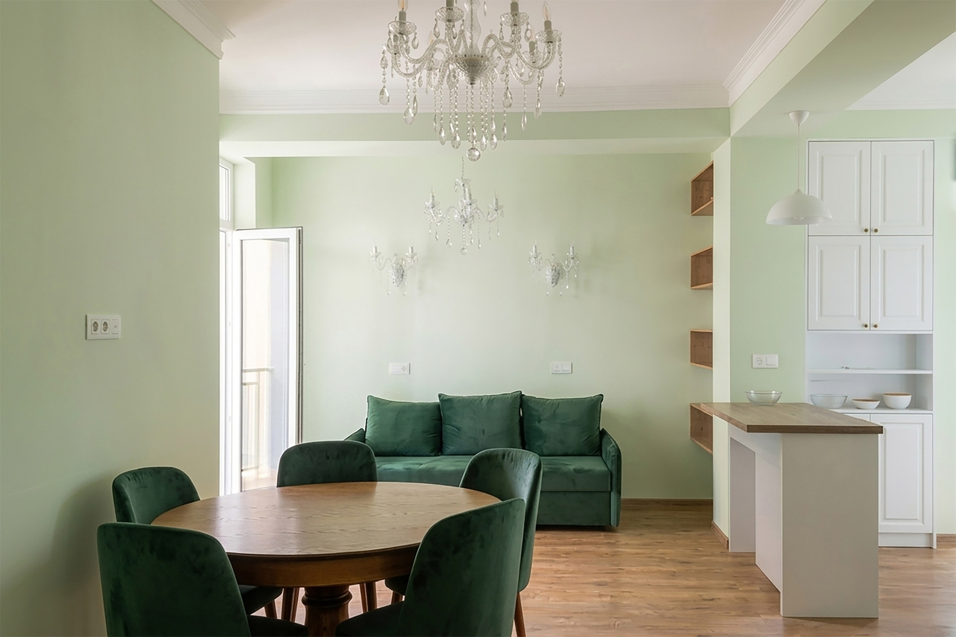 Bright living room with a large dining table, perfect for meals together.