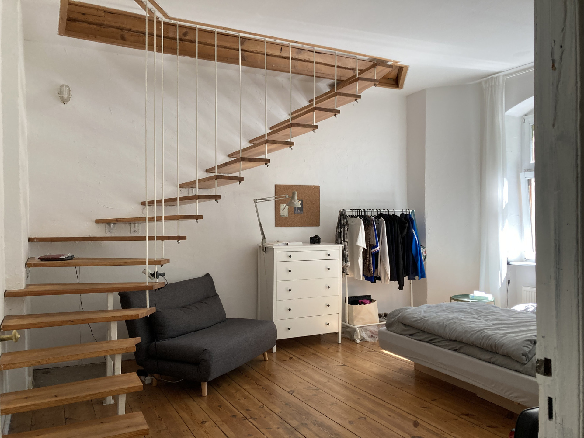 Bedroom with beautifully aesthetic indoor stairs!
