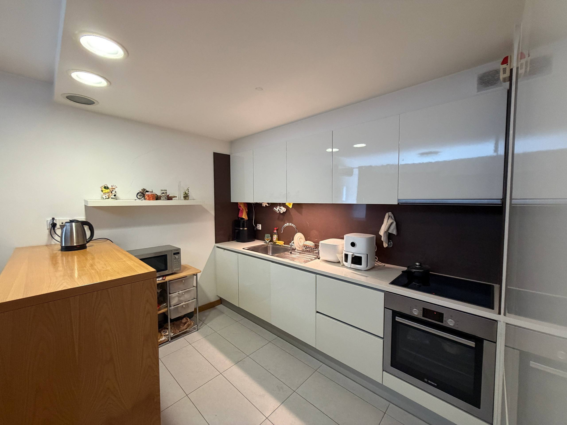 Modern white kitchen with oven