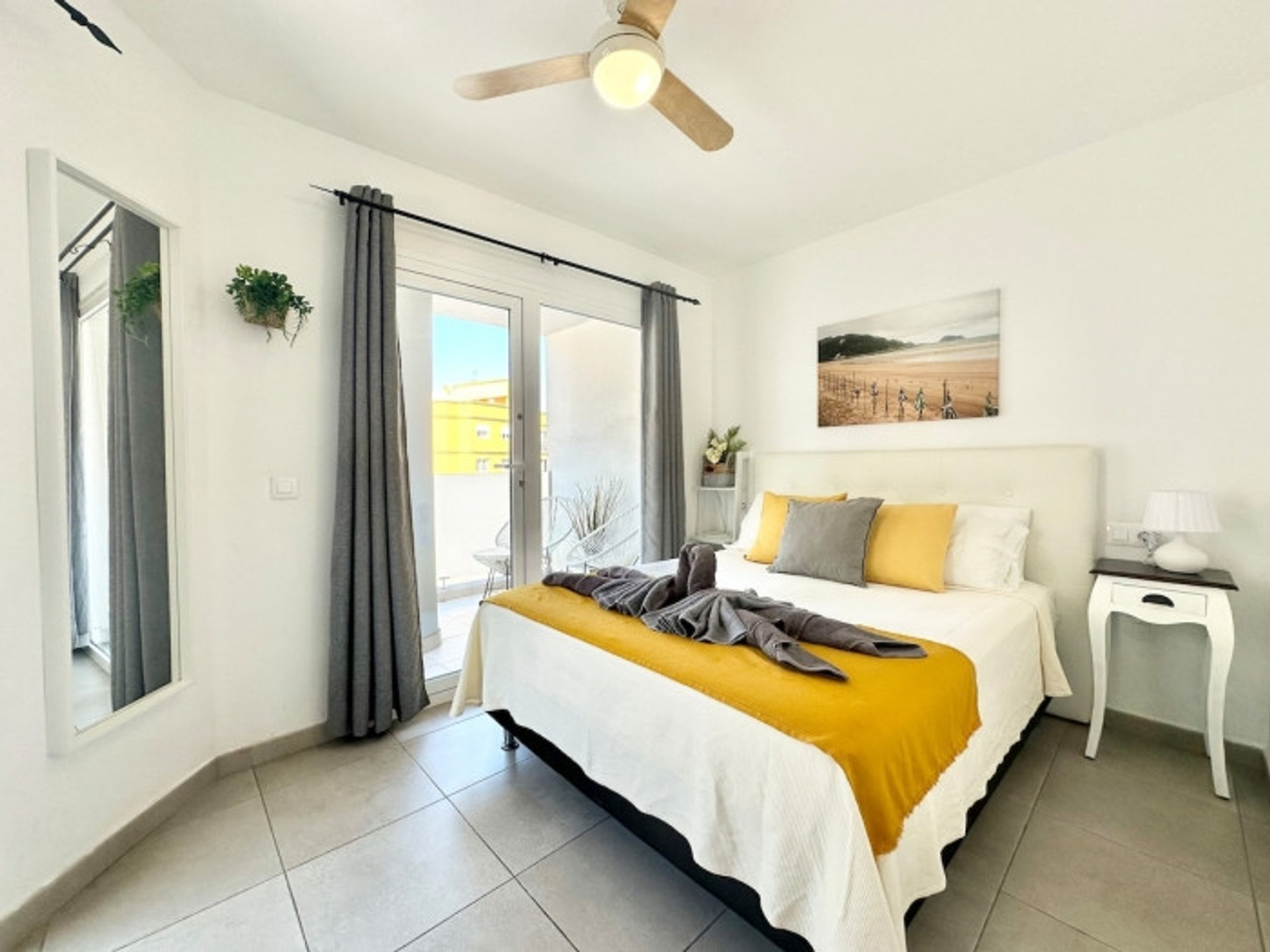 Bright bedroom with double bed