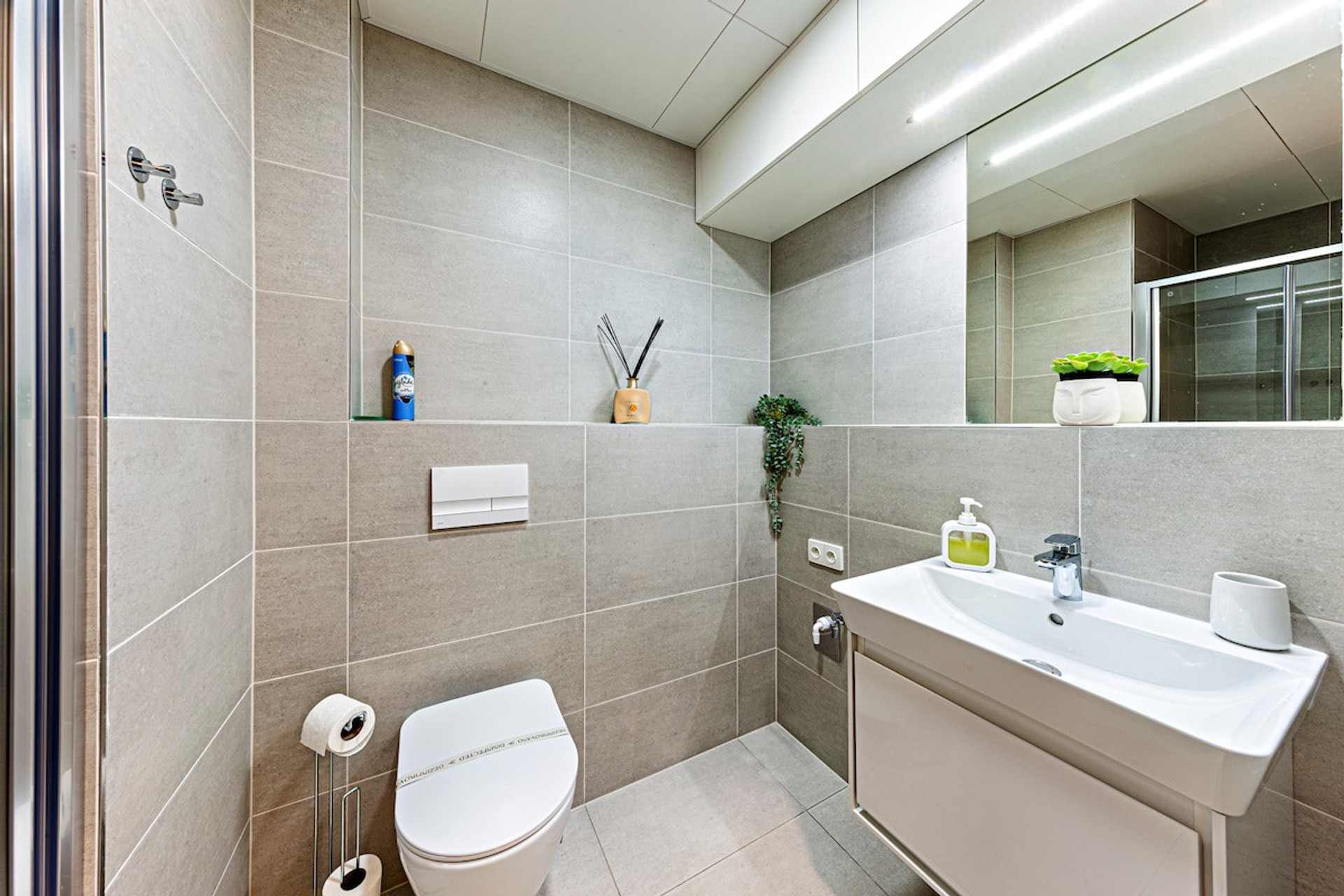 Clean modern bathroom with essentials provided