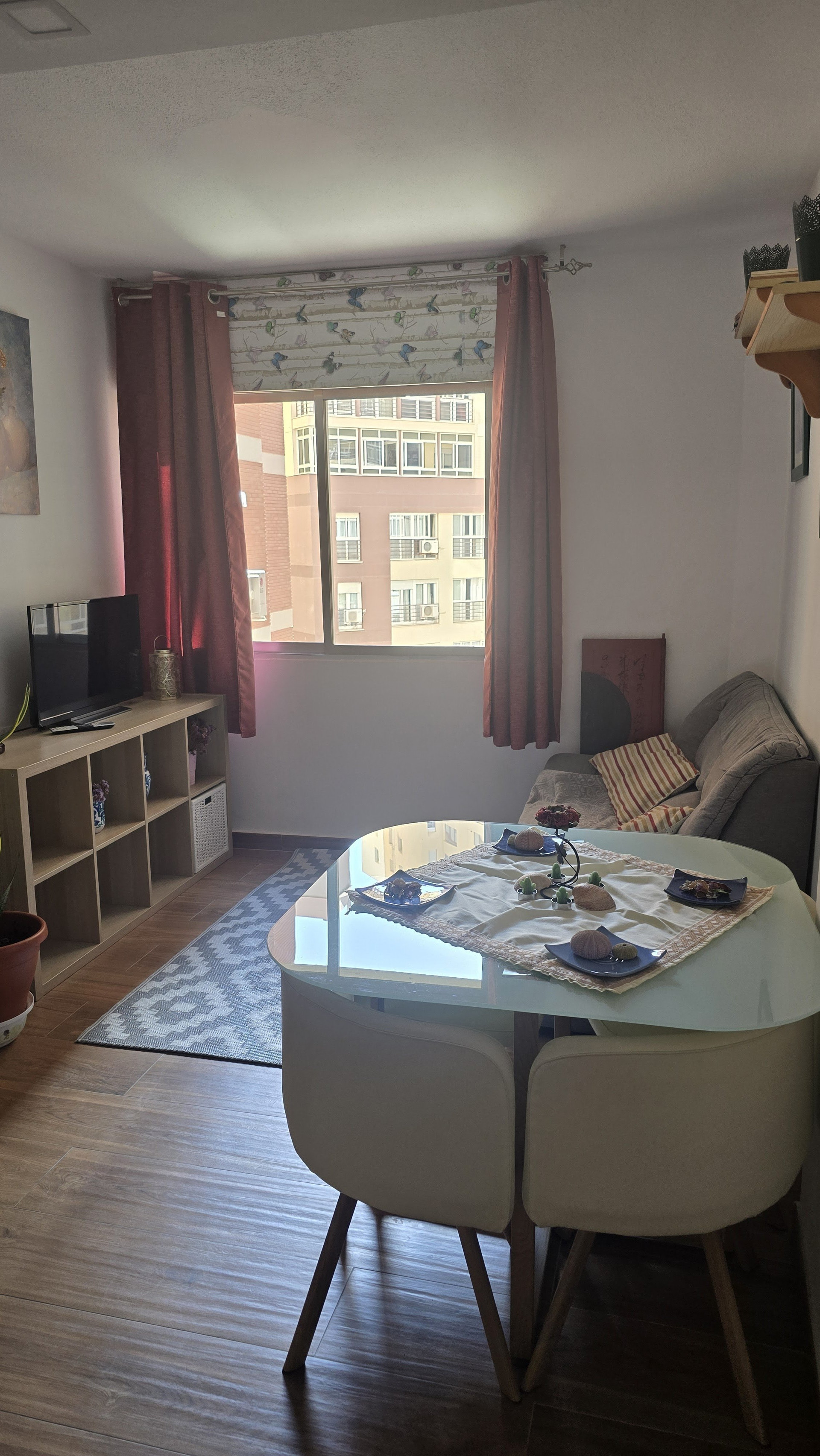 Dining area with table and sofa