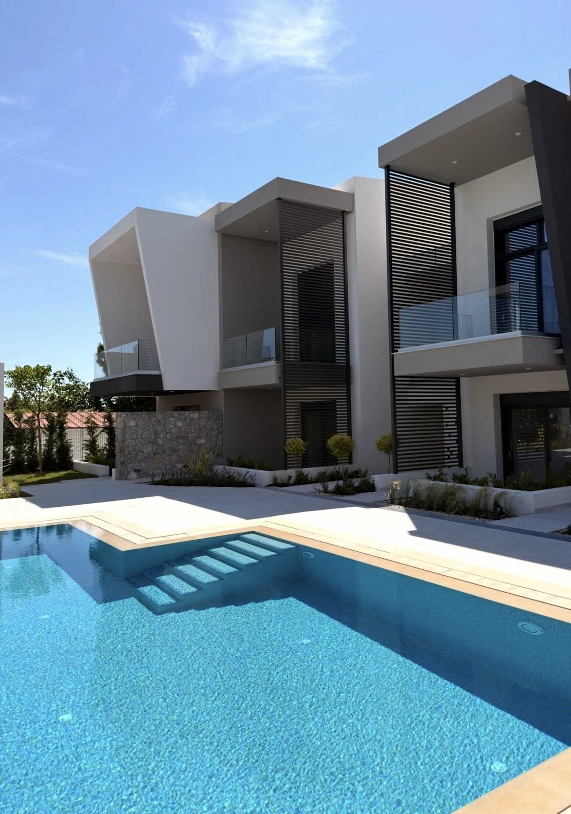 Contemporary building exterior with pool